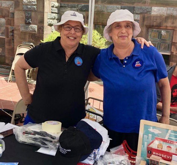 Roosevelt Island Day in Pictures, 2019 Historian Judith Berdy (L) with a helping hand, Ellen Jacoby, from the Historical Society.